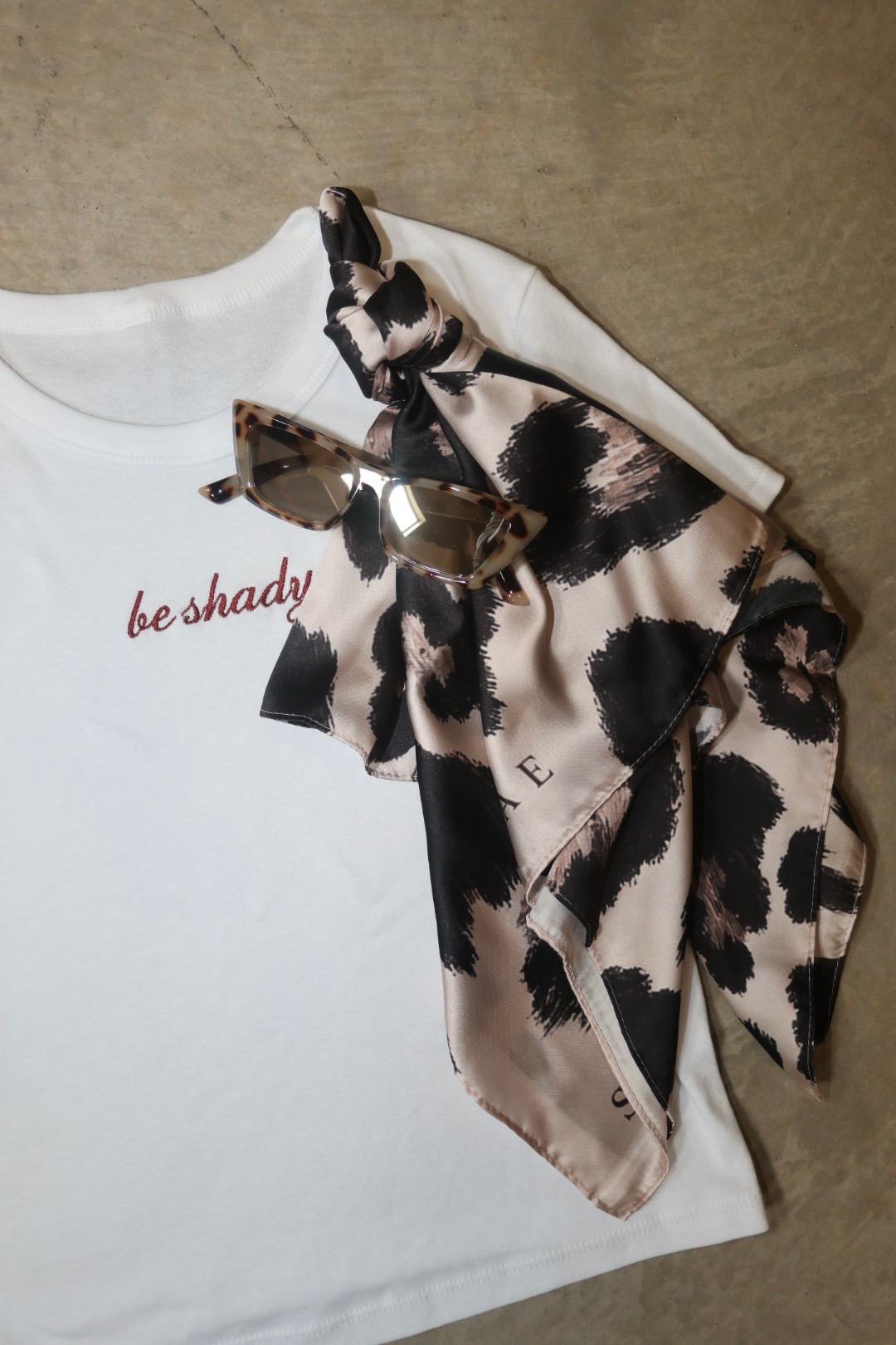 WILD scarf styled with the be shady baby tee and tortoise cat-eye shades
