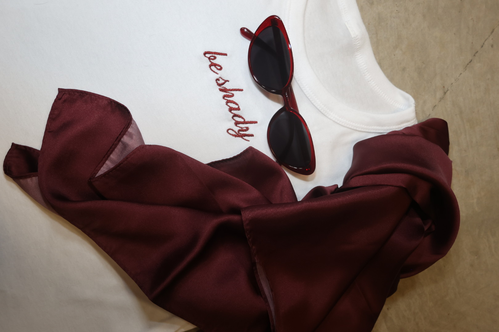 MERLOT scarf styled with the be shady baby tee and cat-eye shades